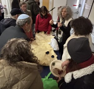Rabbi Linda leading program participants
